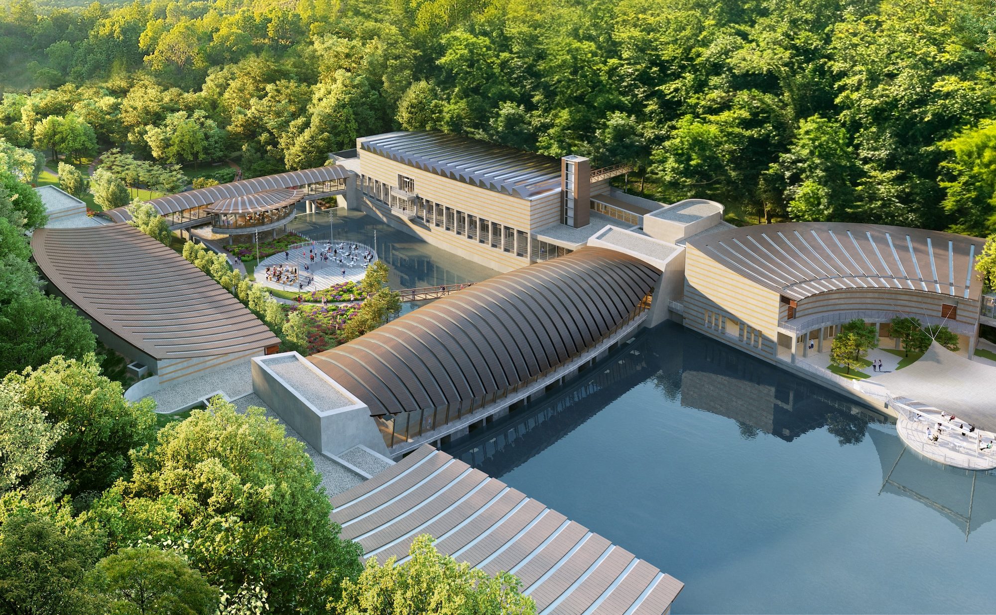 Modern architecture with curved roofs by water, lush greenery, gardens, and open gathering areas.