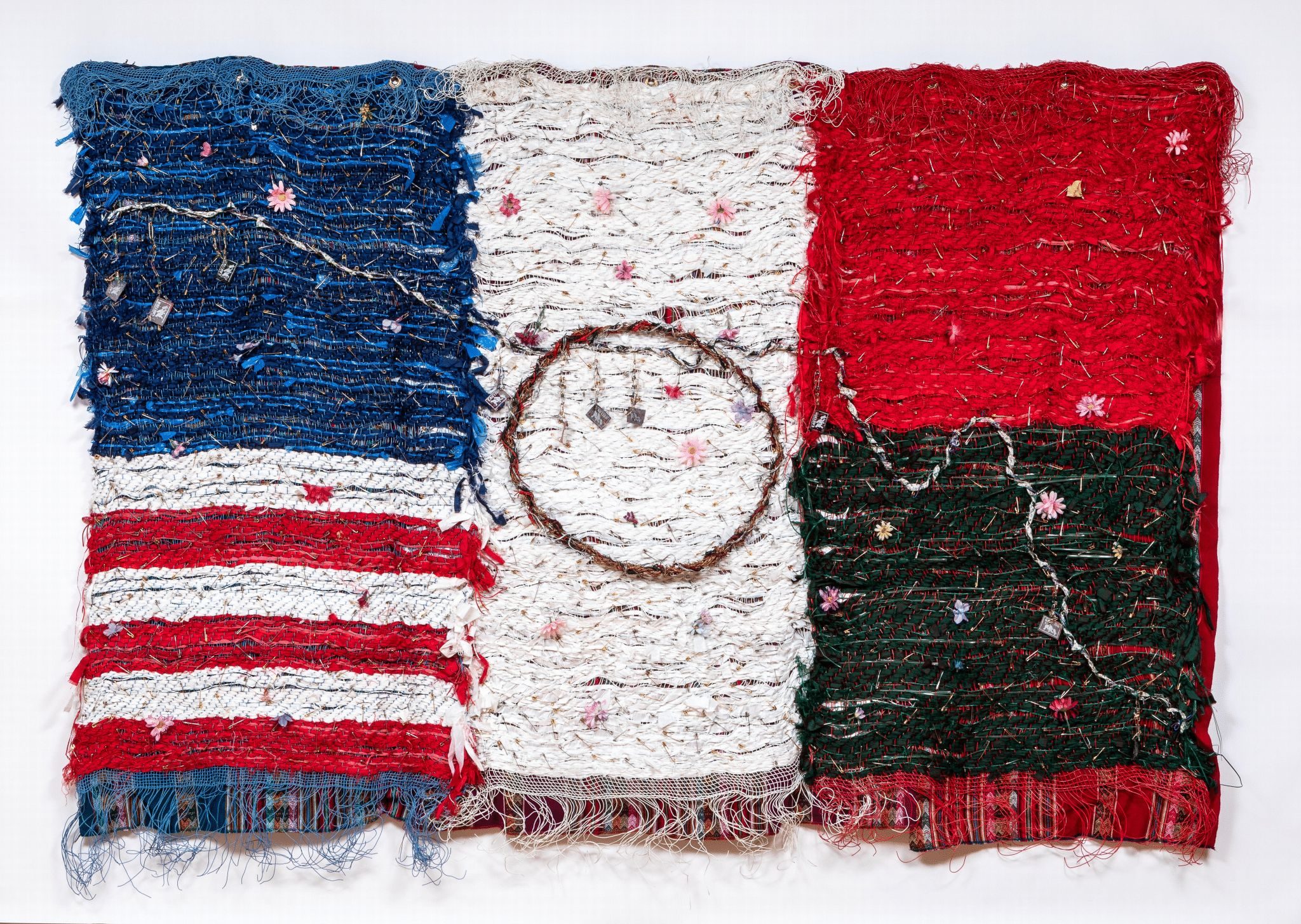Consuelo Jimenez Underwood, Home of the Brave Woven textile with blue, white, and red sections; intricate designs and circular pattern.