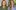 Katie Couric & Olivia Walton Two women smiling in portraits; one in green with blonde hair, the other in blue with brown hair.