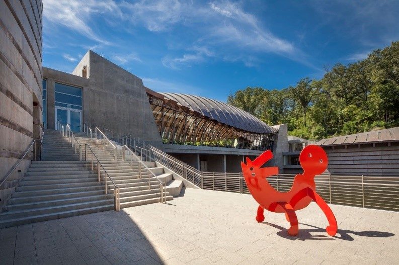 Walker Landing with Two-Headed Figure sculpture by Keith Haring