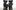 KAWS, <I>FAMILY</I>, 2021, bronze, paint, 86 1/4 in. x 81 1/2 in. x 37 5/8 in. © KAWS Four black sculptures depicting a family by the artist KAWS.