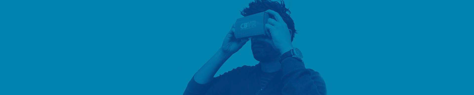 vr-banner-image-blue Person holding a